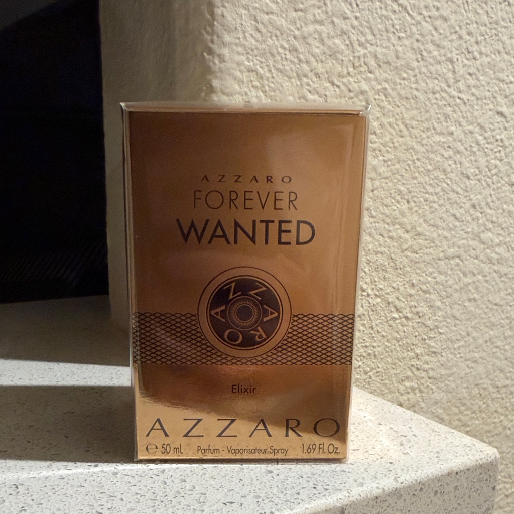 Azzaro Perfume In Gold Packaging